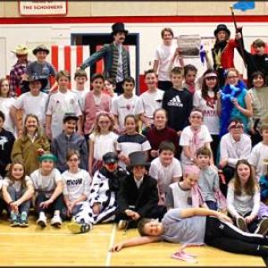 Students of CRMS 6th grade pose in the gym after their circus performance.