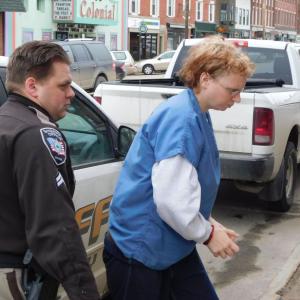 Sharon Carrillo looks down as she is led into Waldo County Superior Court. (photo by Erica Thoms)