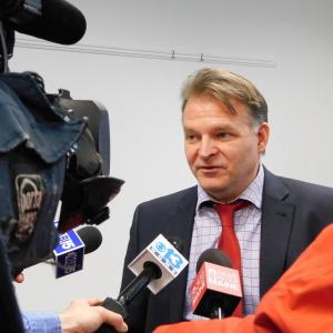 Nordic Aquafarms Chief Executive Officer Erik Heim speaking with reporters after making the initial announcement about his company’s plans. (photo by Erica Thoms)