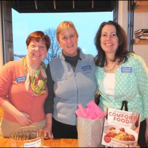 COC staff members Amy Rollins, Elizabeth Burrell and Diane Norton greet people as they enter 250 Main Street.