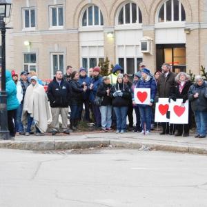 A crowd gathers in Belfast Town Square for a vigil for Marissa Kennedy,
the little girl allegedly slain by her mother and stepfather. (photo by Erica Thoms)