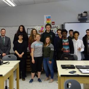 Waldo County Sheriff School Resource Officer Deputy Jordan Tozier stands far left with Mount View Principal Zackary Freeman to the immediate right. Students in the Advanced Art class stand between Freeman and Eric Phillips, far right, who teaches the class. (Photo by Erica Thoms)