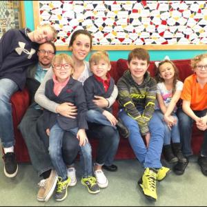The Sidelinger family waits for the Easter Bunny at the Y. Left to right: Donavon, Jody, Molly, Brennan, Lennox, Kael, Annabella and Kayden.