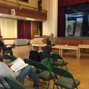 Director Daryl Hahn works with members of the cast of ‘The Pirates of Penzance,’ this summer’s musical to be performed in Watts Hall, Thomaston, the last weekend of June and the first weekend of July.