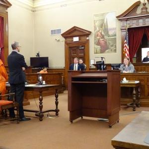 Sharon Carrillo and her attorney Chris MacLean (far left) stand before Justice Robert Murray in Waldo County Supreme Court at an earlier appearance. (photo by Erica Thoms)