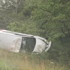A driver heading east on Route 17 July 24 went off the road, with his vehicle rolling over and hitting a tree. (Photo courtesy Savana Adolphsen)