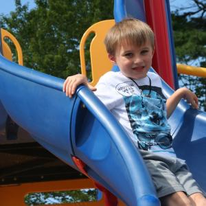 Jude Whitney gets ready to go down the slide. (Photo courtesy Thomaston Grammar School)