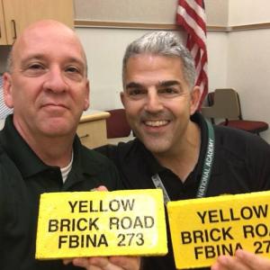 Chief Deputy Jason Trundy (left) poses with the yellow brick he earned after completing the FBI National Academy’s Yellow Brick Road challenge. (photo courtesy of Chief Deputy Trundy)