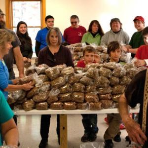 Volunteers at the Penobscot Pet Pantry in Camden gather on the first Thursday of every month to distribute pet food and other supplies to individuals and families who have applied to receive support for their furry family members. (Photo courtesy of the Penobscot Pet Pantry)