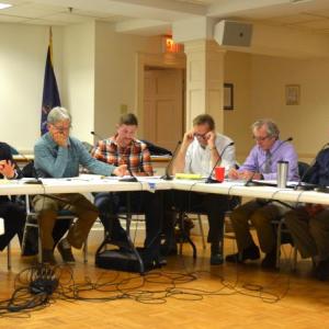Fayette Town Manager Mark Robinson, Preti Flaherty attorney Dan Walker, Camden Select Board Chairman Bob Falciani, Camden Select Board member Taylor Benzie, Rockport Select Board Chairman Doug Cole, Rockport Town Manager Rick Bates, Camden Select Board member Marc Ratner, Camden Town Manager Audra Caler-Bell, and Rep. Owen Casas, I-Rockport., Oct. 20, Rockport. (Photo by Lynda Clancy)