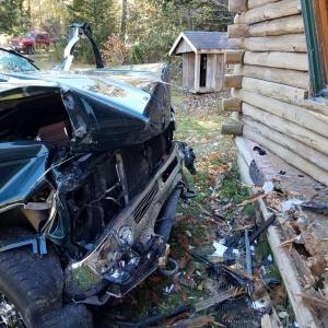 The vehicle of an unconscious driver comes to rest on private property. (Photo courtesy of Knox County Sheriff's Office)