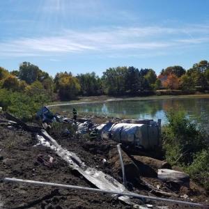 A tanker truck hauling milk crashed through guardrails on I-295 South, Friday, Oct. 26. (Photo courtesy of Maine State Police)