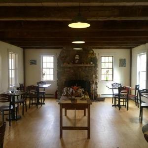 Briar Patch boasts a clean but intimate aesthetic augmented by an impressive stone fireplace. (Photo by Jenna Lookner)
