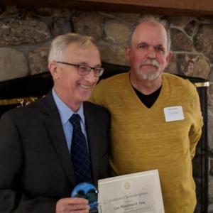 Lee Woodward, Esquire, was recognized by the Belfast Area Chamber of Commerce as the 2018 for his commitment to his community. Pictured with him here is Michael Hurley, Belfast City Councilor. (Photo courtesy Belfast Area Chamber of Commerce)