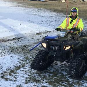 Mike Bonney, Snow Bowl staff member, is busy making snow Dec. 4 at Ragged Mountain.