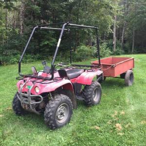 An image of the stolen four-wheeler (trailer not reported stolen) used with permission of the owner.