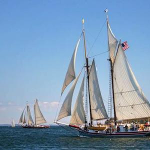 Photographer Tracy Sheppard is honored for her photo “Parade of Sail.”