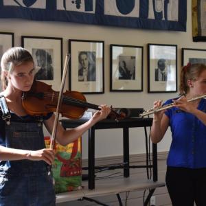 Katherine O’Brien, violin and Leanna Cotton, flute in rehearsal. (Photo courtesy of Bay Chamber Concerts)