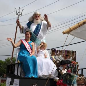2018 Maine Sea Goddess Erin Dugan rides in the Maine Lobster Festival Parade with King Neptune and 2018 Crown Bearer Bella Knight. (Photo courtesy Maine Lobster Festival)