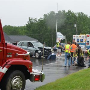 Crashes are common in the Midcoast, especially on the arterial highways of routes 1, 17 and 90 in Rockport. Firefighters and ambulances are frequently at the scene together. (File photo of a 2013 Rockport crash. Photo by Lynda Clancy)