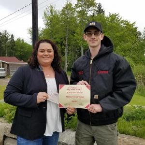 Bradley Nystrom is the 2018 Horch Roofing Trade Scholarship recipient, pictured here with Horch Roofing V.P. of Operations, Stacey Lytton. (Photo courtesy Horch Roofing)