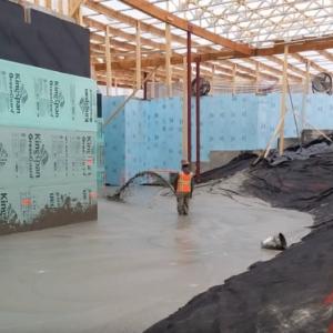 Concrete being poured at the site of the new Camden-Rockport Middle School in Camden. )Source: SAD 28 Youtube) camden, maine, middle school, MSAD #28, construction