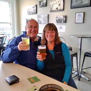Larry and Rose Bull enjoying a pint at Liberator Brewing Co. in Rockland, one of the breweries on their tour. (Photo courtesy Larry Bull)