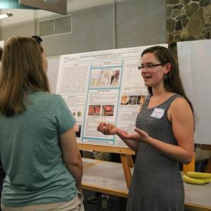 Megan Driscoll presents her work on algae-based bioplastics Aug. 6 at the SEA Fellows Symposium at the Darling Marine Center. (Photo courtesy Darling Marine Center)