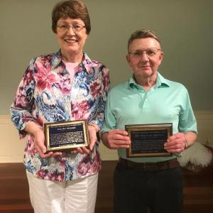 Award-winner Sheila Hart McFarland (left) stands with American Legionnaire member Rodney Lynch, who received the award on behalf of Camden American Legion War Memorial Post 30. (Photo courtesy Camden High School Alumni Association)