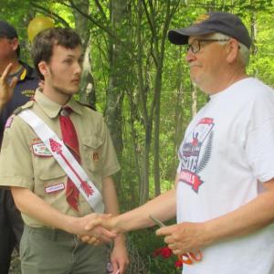 Edwin Stone, left, with George Gould. Medomak Valley athletic director Matt Lash is on the far left. (Courtesy Caren Clark).