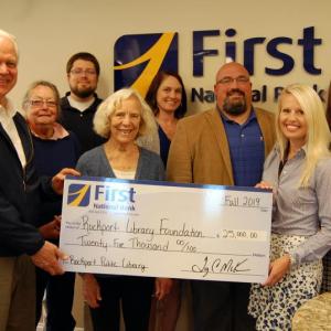First National Bank presents a donation to the Rockport Library Foundation. L-R: RLF VP John Viehman, RLF Secretary Sarah Rheault, First National Bank’s JB Usher, RLF President Joan Welsh, First National Bank’s Rebecca St. Clair, Jake Miller, Samantha Hill, and Angela Parent. (Photo by First National Bank’s Samantha Glaude)