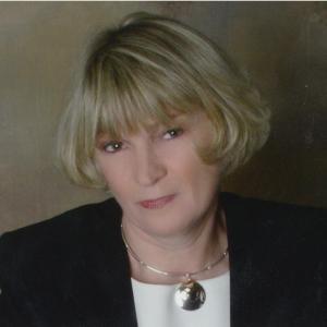 Lisa E. Carlson.