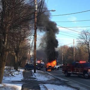 Both drivers were away from the flames by the time a pickup truck became fully engulfed with fire. (Photo by Steve Cartwright)