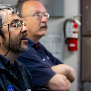Senior Research Scientist Barney Balch, left, and Senior Research Associate Bruce Bowler study incoming data during a research cruise in the Gulf of Maine. Balch will lead a team from Bigelow Laboratory for Ocean Sciences to investigate a globally-important algae during an upcoming research cruise in the Southern Ocean. Courtesy of Bigelow Laboratory for Ocean Sciences