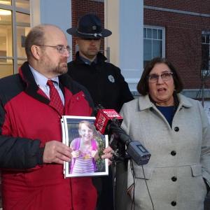 Assistant Attorneys General Donald Macomber (L) and Leane Zainea (R) hold a picture of Marissa Kennedy as they speak to reporters following Sharon Kennedy’s (FKA Sharon Carrillo) December conviction. Jurors returned a guilty verdict after less than five hours of deliberation. (photo by Erica Thoms)