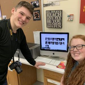 Medomak Valley sophomore Jame Rose and senior Emma Kavan work on the #WhyYouMatter campaign. (Courtesy Brooke Holland)