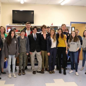 Sen. Herbig, center, with Maine Ocean School students and administrators. Also pictured are Sen. Dave Miramant, D-Camden (far left) and Senate President Troy Jackson, D-Allagash (far right).