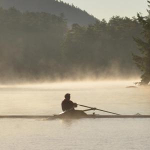 A rower out early Megunticook Lake (File photo: Lynda Clancy)