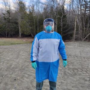 This is full protection for EMS personnel in days of COVID-19: A plastic face shield, durable and washable gown, gloves, N95 mask and (not seen in this photo) booties over the boots. (Photo courtesy Amy Dyer Drinkwater)