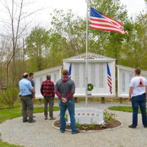 Lincolnville firefighters Don Fullington, Jr., Mike Eugley, Pete Rollins, Jonathan Ward, Nick Watts, Bradlee Watts, and Ben Hazen mark Memorial Day with a simple, heartfelt observance. (Photo by Lynda Clancy)