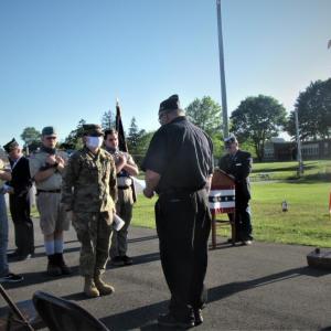 2020 Flag-burning ceremony in Thomaston. From left to right: Scout Nicholas Simoneau, 1st Vice-Commander Jeremey Miller, Scout James Lent, National Guard Specialist and Sergeant-at-Arms, Angel White, Scout John Comeau, Adjutant Kent Woodward and Commander William Demmons. (Photo by Inge Robinson)