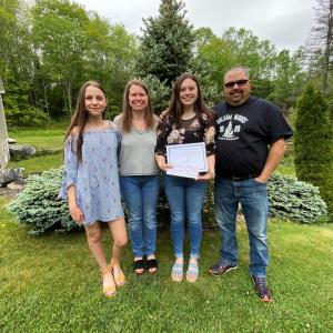 Ashley Holmes, third from right, stands with her family. (Photo credit: Ashley Holmes)