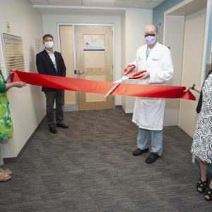 Kirk Bernadino, MD, medical director of Pen Bay Gastroenterology, cuts a ribbon to mark the official opening of the new gastroenterology suite in the Physicians Building on the campus of Pen Bay Medical Center. Above, left to right: Cindy Feyler, practice manager; Mark Fourre, MD, president of PBMC and Waldo County General Hospital; Dr. Bernadino; and Lyn Faller, director of physician practices. (Photo courtesy Pen Bay Medical Center)