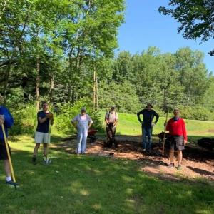 West Bay Rotarians work in the heat for their animal friends. (Photo courtesy West Bay Rotary)