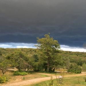 Appleton at sundown, with a strong storm heading east over Jones Hill. The system had come in from the west and filled the sky with dense clouds and electrifying light. (Photo courtesy Penelope Olson)