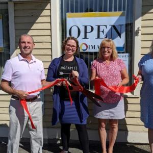Ribbon cutting at IMAGES: Steve Ryan, Belfast Area Chamber; Shawna Barnes, owner; Linda Foster, manager; Pam Colson, Mark’s Printing House . (Photo courtesy IMAGES Belfast, LLC)