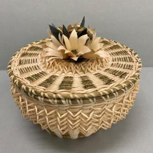 Molly Neptune Parker (1939-2020), Passamaquoddy, Flowertop Basket, brown ash and sweetgrass, 2020, from the Hudson Museum’s on-line collection, which allows teachers and
students to explore the museum’s collection remotely and learn about Wabanaki artistic traditions or to reference in conjunction with other virtual resources, including a tour of the Wabanaki gallery. (Photo courtesy Hudson Museum)