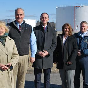 From left, Representative Scott Cuddy, Governor Janet Mills, Tim Theriault, VP of Materials Handling for Sprague, Dan Burgess, Commissioner Heather Johnson, Commissioner Bruce Van Note and Searsport Town Manager James Gillway during a March ceremony in Searsport. (File photo)