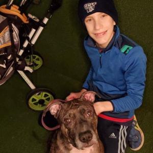 Jason Thurston, Jr., better known as The Golf Boy, and his dog, Lena. (Courtesy Jason Thurston)