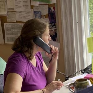 New Hope for Women's advocacy director responds to a call on the agency's 24/7 helpline. (Photo courtesy New Hope for Women)